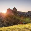 Three hikers in the mountains