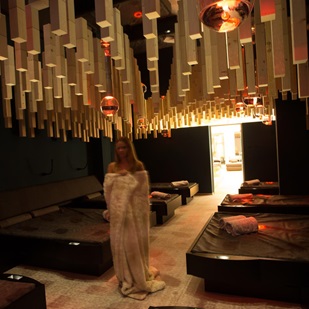 A woman in a relaxation area with water beds