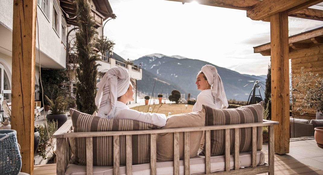 Two women are enjoying the view from a relaxation area