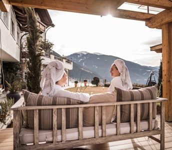 Two women are enjoying the view from a relaxation area