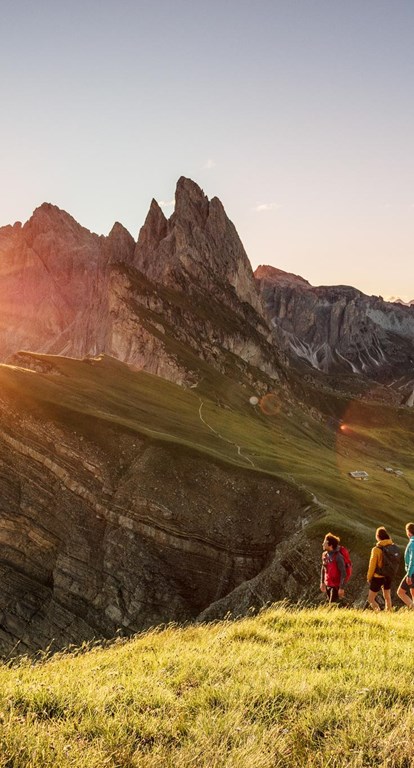 Three hikers in the mountains